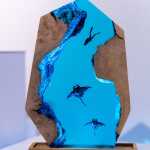 Close view of manta ray and scuba diver ocean resin lamp